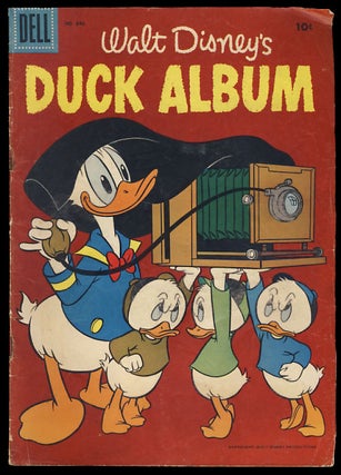 Item #25950 Four Color #840 - Walt Disney's Duck Album. Authors