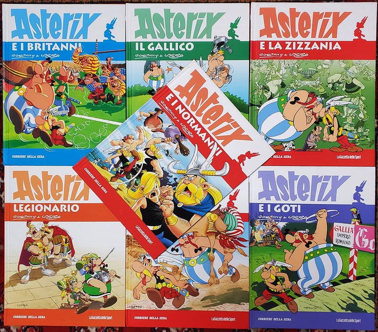 Item #33829 Asterix Italian Edition Seven Volume Lot. (Asterix e i britanni. Asterix e la zizzania. Asterix il gallico. Asterix e i normanni. Asterix legionario. Asterix e i goti. L'odissea di Asterix). René Goscinny, Albert Uderzo.