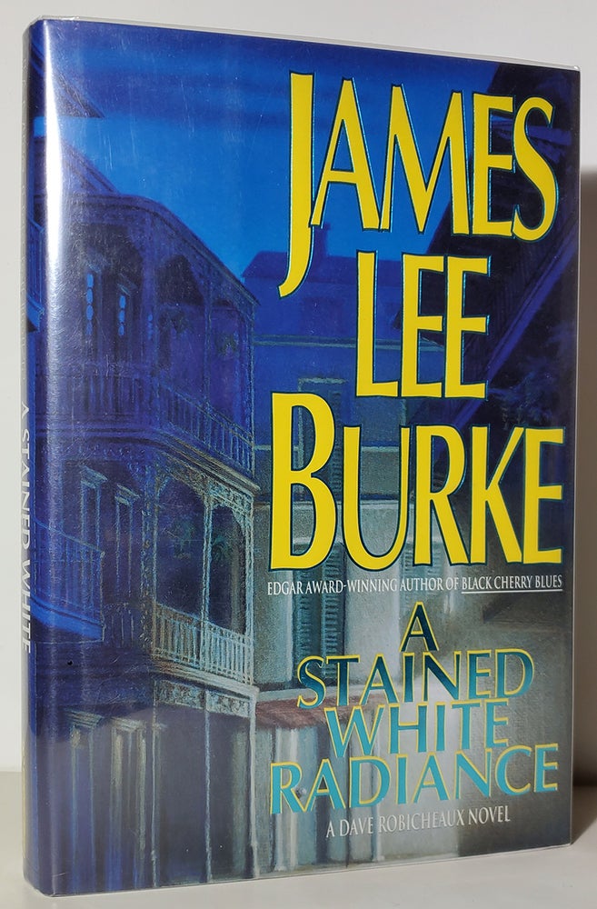 Item #34353 A Stained White Radiance. James Lee Burke.
