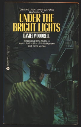 Item #35050 Under the Bright Lights. Daniel Woodrell