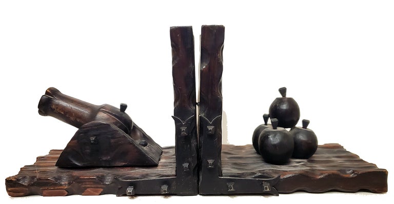 Item #35219 Vintage Carved Wood and Iron Cannon and Cannonballs Bookends. Bookends.