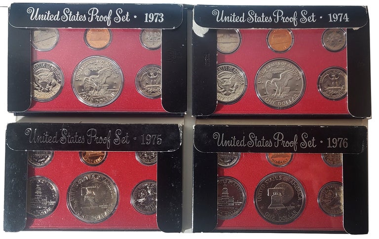 Item #36528 Group of Four United States Proof Sets + 2 U. S. Uncirculated Coin Sets. United States Mint.