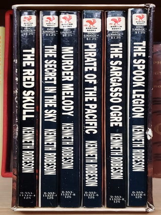 Set of Six Doc Savage Novels in the Original Slipcase. (The Red Skull, The Spook Legion, The Secret in the Sky, Pirate of the Pacific, Murder Melody, The Sargasso Ogre).