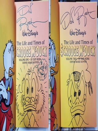 Item #37030 The Life and Times of Scrooge McDuck Volume One and Volume Two. (Signed and with...