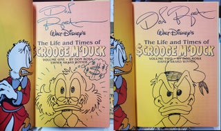 Item #37030 The Life and Times of Scrooge McDuck Volume One and Volume Two. (Signed and with...