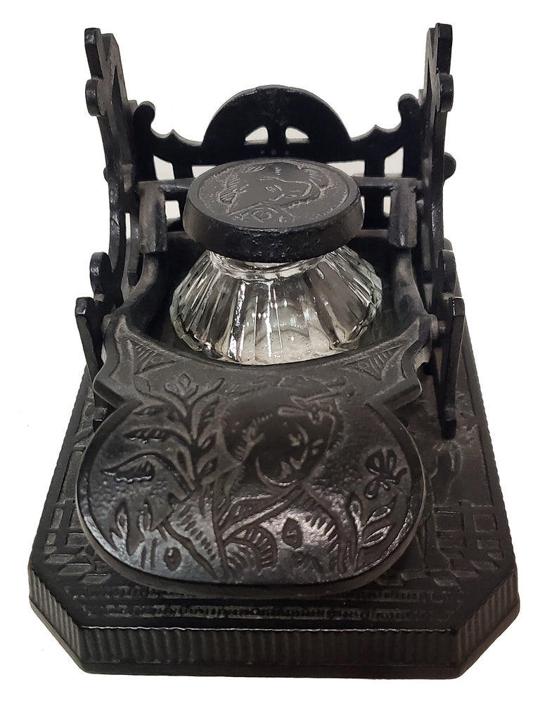 Item #39430 Brooke & Co. Cast Iron Mechanical Inkwell and Pen Holder with Japanese Geisha Motifs. Brooke, Co.