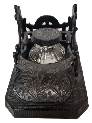 Brooke & Co. Cast Iron Mechanical Inkwell and Pen Holder with Japanese Geisha Motifs. Brooke, Co.