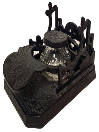 Brooke & Co. Cast Iron Mechanical Inkwell and Pen Holder with Japanese Geisha Motifs.