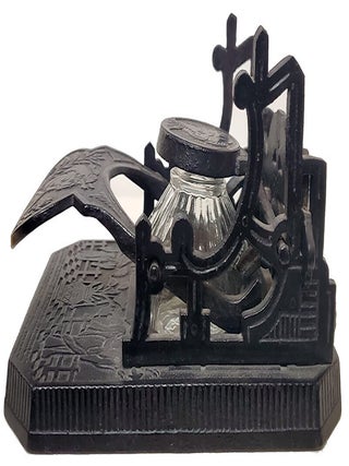 Brooke & Co. Cast Iron Mechanical Inkwell and Pen Holder with Japanese Geisha Motifs.